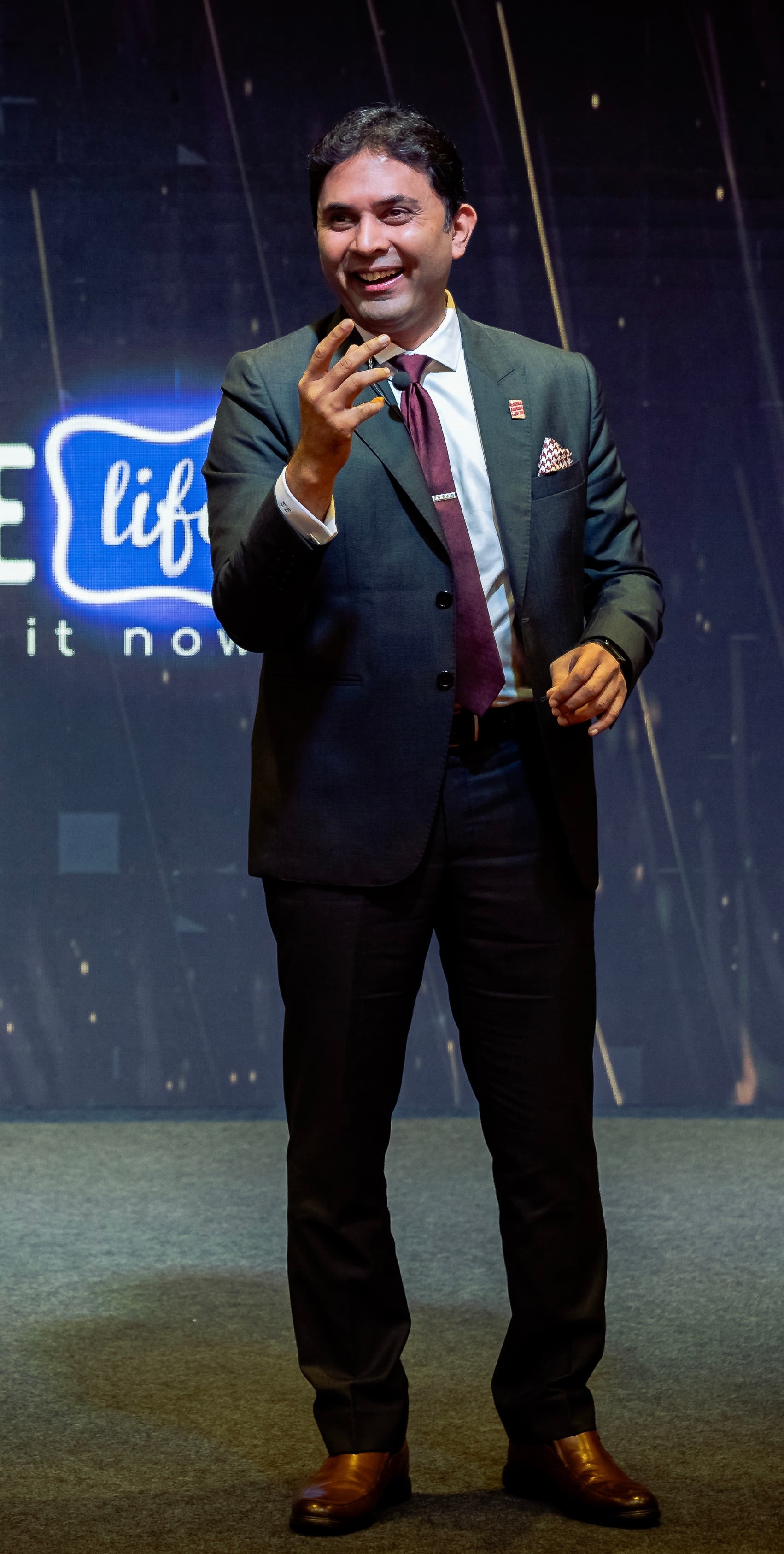 Sidharth Shah speaking on stage